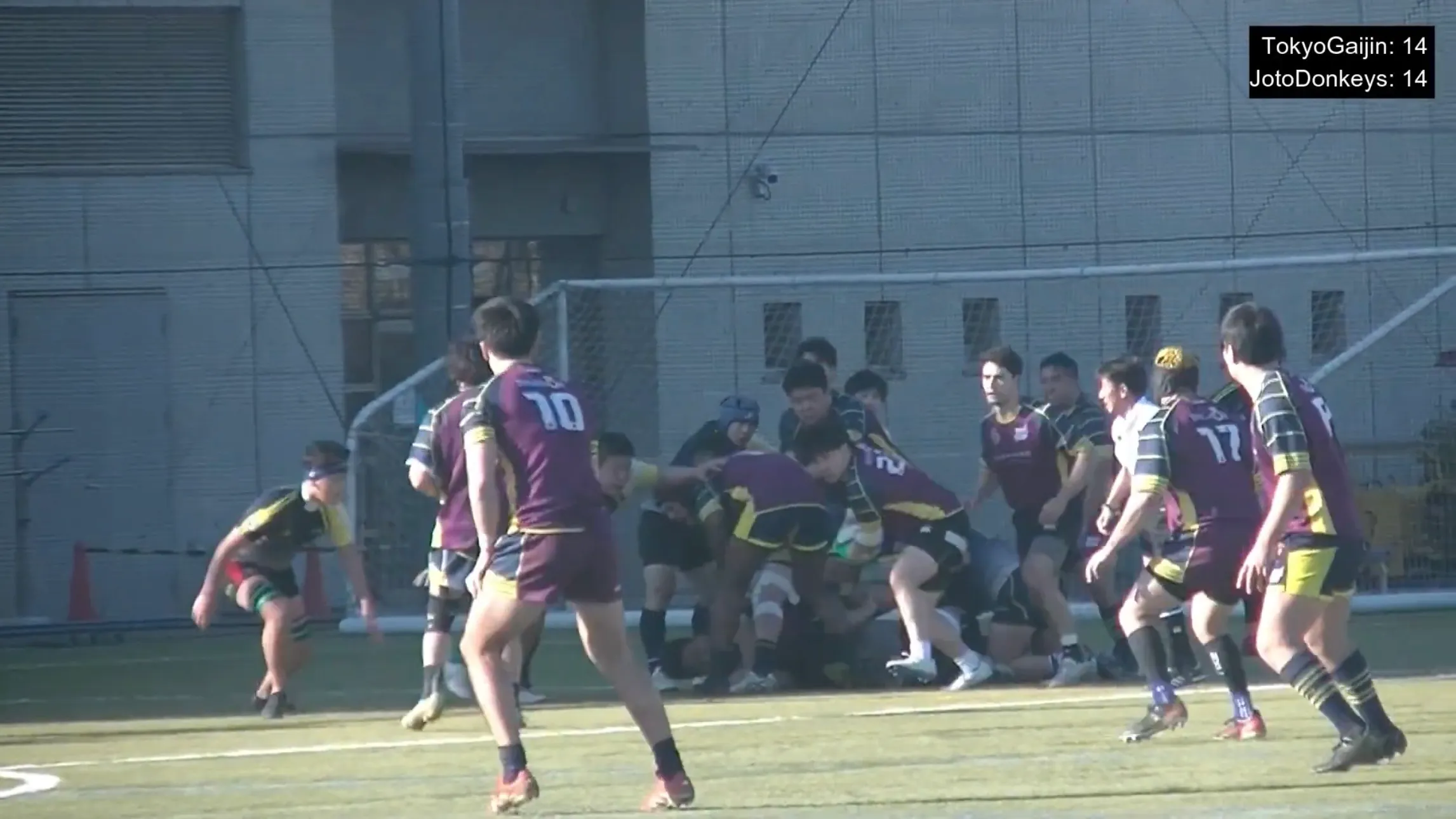 Tokyo Gaijin RFC team huddle during the match against Joto Donkeys
